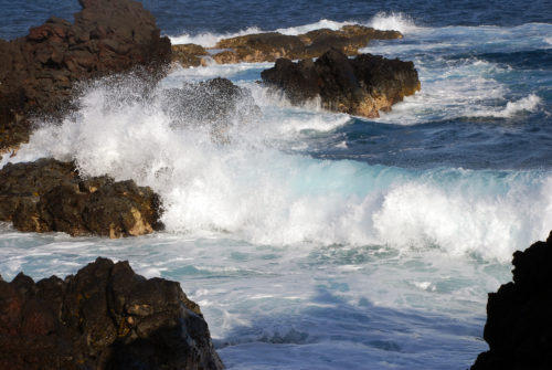 waves crashing in Hawaii